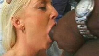 Blonde MIlf sucks a black cock - porn video
