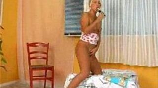 Blond chick and her dildo - porn video